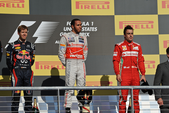 Sebastian Vettel (L), Lewis Hamilton (C) and Fernano Alonso (R)